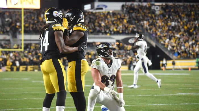 Dec 5, 2021; Pittsburgh, Pennsylvania, USA; Pittsburgh Steelers safety Terrell Edmunds (34) and linebacker Devin Bush (55) celebrate after Baltimore Ravens tight end Mark Andrews (89) dropped a two-point conversion pass from quarterback Lamar Jackson (8) in the final minute. The Steelers won 20-19 at Heinz Field.